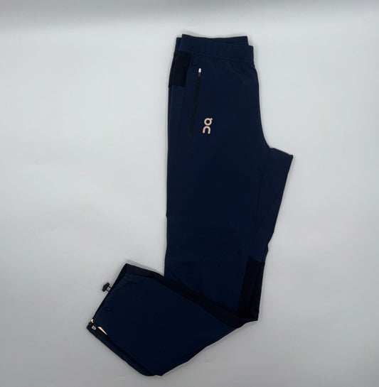 ON RUNNING TRACK PANTS
