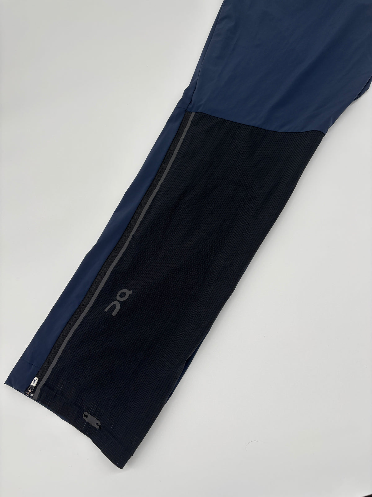 ON RUNNING TRACK PANTS