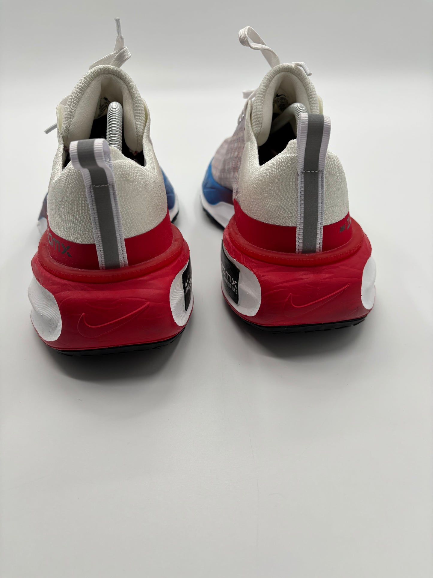 NIKE ZOOMX FLYKNIT TRAINERS